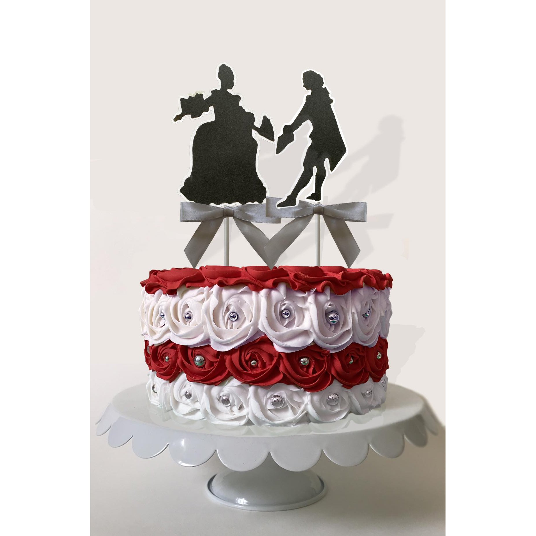 green silhouette cake toppers of a girl